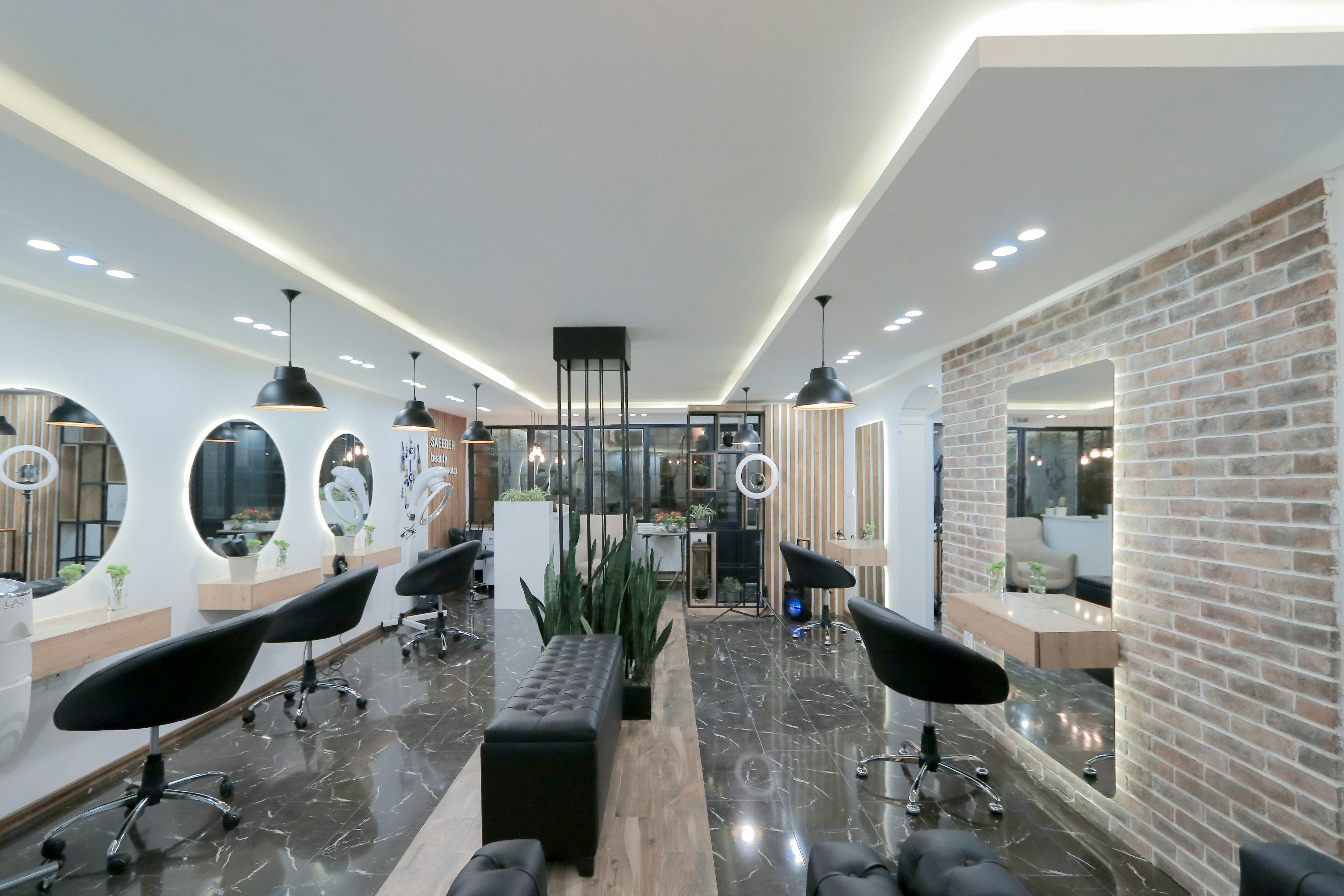 Maison Aurelle salon floor — styling stations