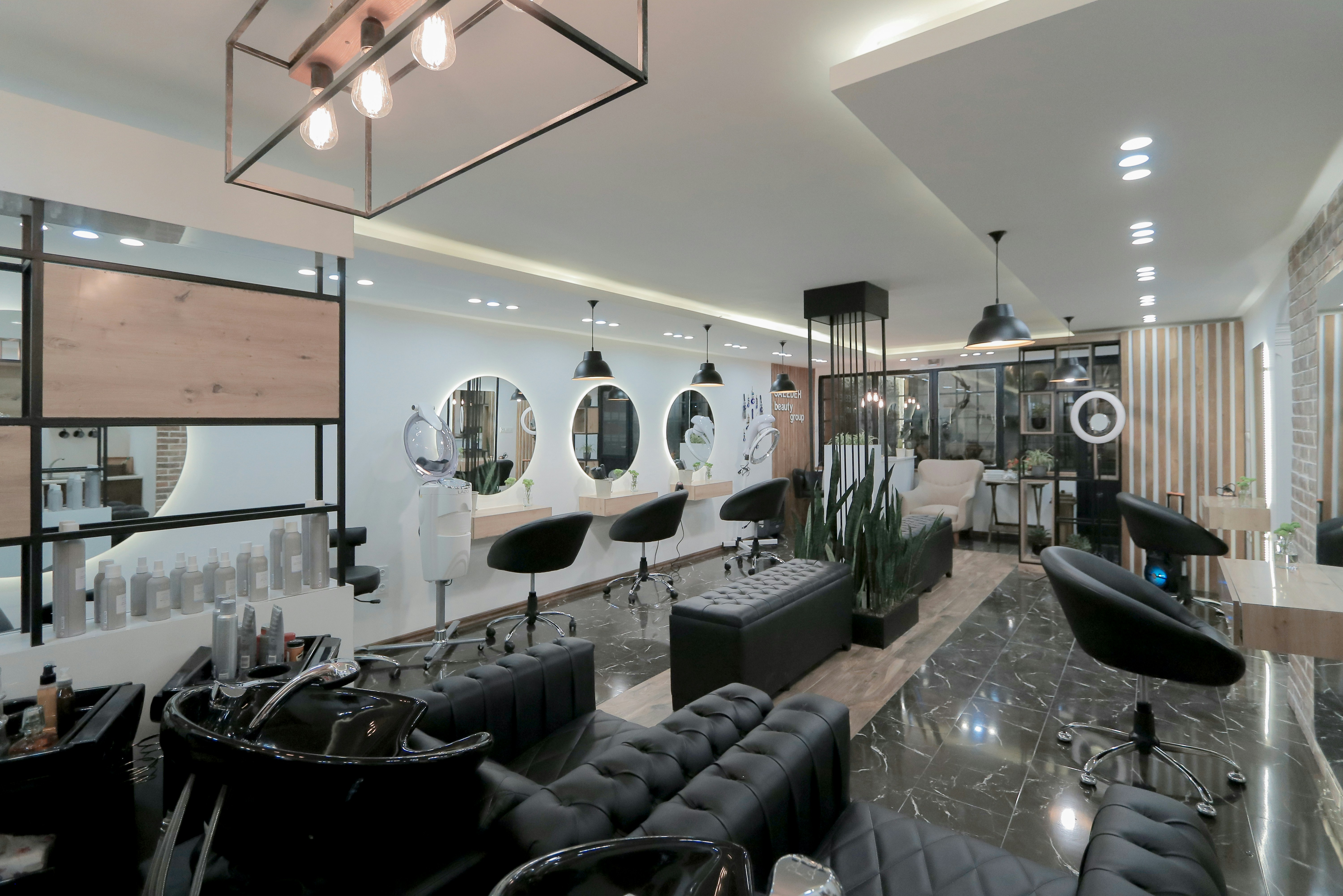 Maison Aurelle salon floor — wash and lounge area